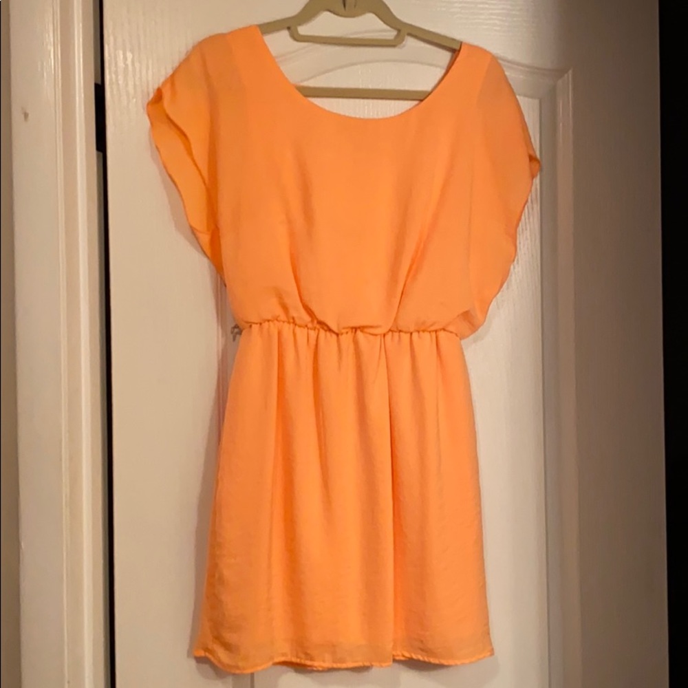 Bright pastel orange dress